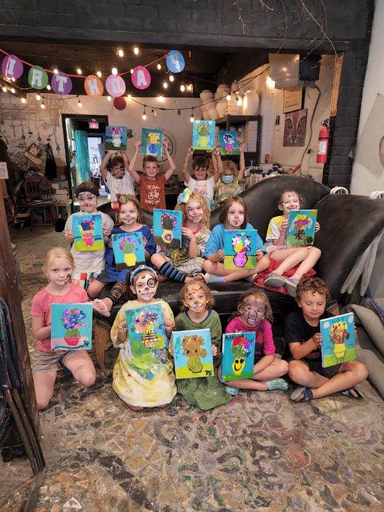 smiling children at an art birthday party at Mermaid Art Studios